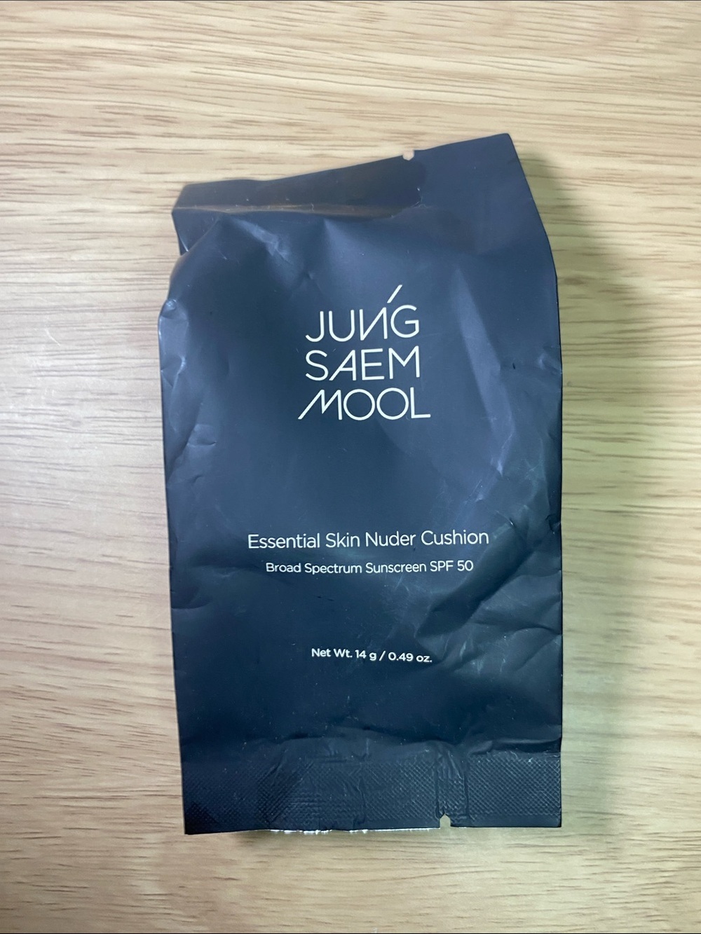 Essential Skin Nuder Cushion SPF 50 — Black